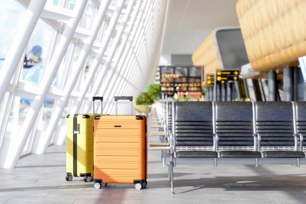 Waiting Area In Airport With Luggages Near The Seats And Blurred Background
